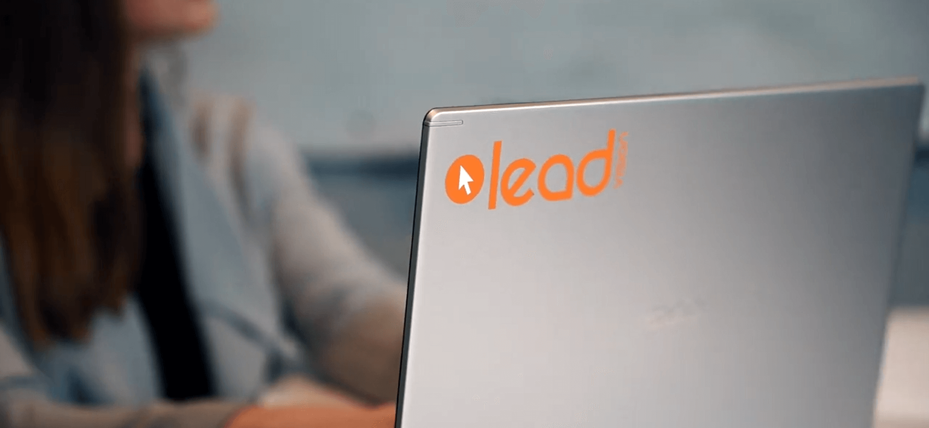 close up of a LeadVision sticker on a laptop