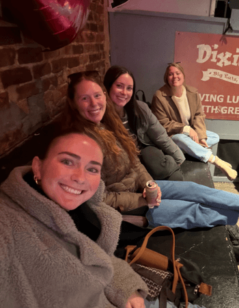 leadvision employees smiling at a happy hour